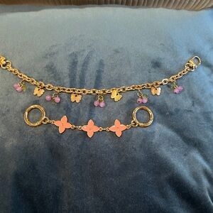 Unbranded bag charms - pink flowers and yellow butterflies 🦋